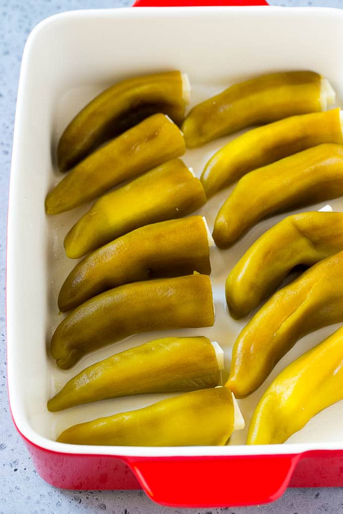 Chile Relleno Casserole Recipe | Baked Chile Rellenos | Mexican Casserole #casserole #chiles #mexican #cheese #dinner #ezlod Cheese stuffed chiles in a baking dish.
