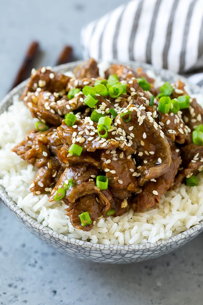 Slow Cooker Korean Beef Recipe | Korean Beef | Flank Steak Recipe #dinner #beef #slowcooker #crockpot #asian #ezlod Slow cooker Korean beef served over steamed rice.