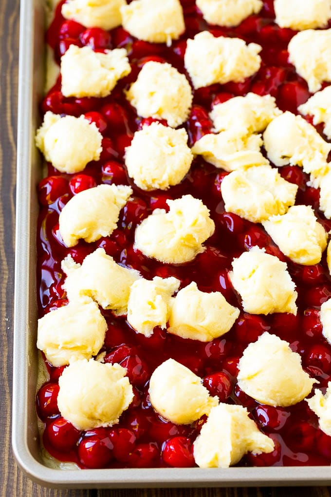 Cherry Bars Recipe | Cherry Pie Bars | Cherry Cookies | Bar Cookies #cookies #bars #cherry #baking #dessert #sweets #ezlod Filling with dollops of cookie dough on top.