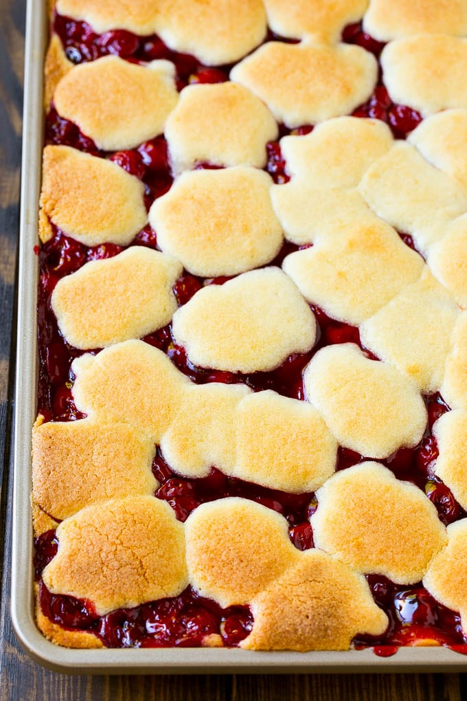Cherry Bars Recipe | Cherry Pie Bars | Cherry Cookies | Bar Cookies #cookies #bars #cherry #baking #dessert #sweets #ezlod A pan of baked dough and filling.