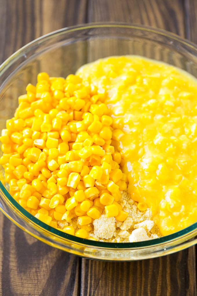 Corn Pudding Recipe | Corn Casserole | Corn Side Dish #corn #pudding #casserole #sidedish #thanksgiving #dinner #ezlod Corn kernels, creamed corn and cornbread mix in a bowl.