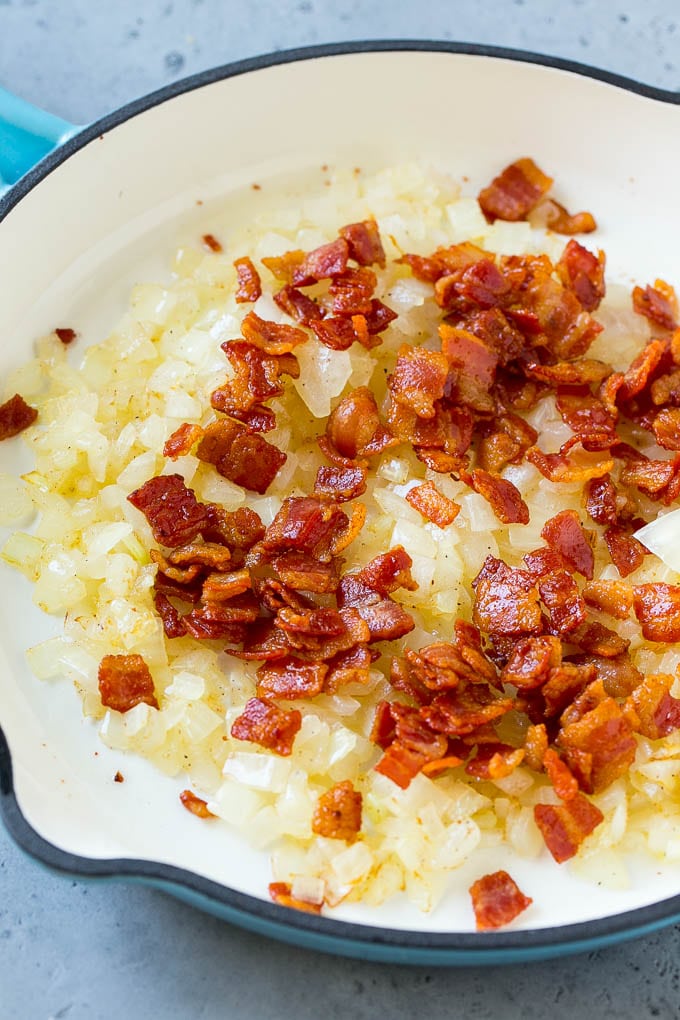 Fried Cabbage Recipe | Cabbage with Bacon | Cabbage Side Dish #cabbage #bacon #sidedish #lowcarb #keto #ezlod Sauteed bacon and onions in a skillet.