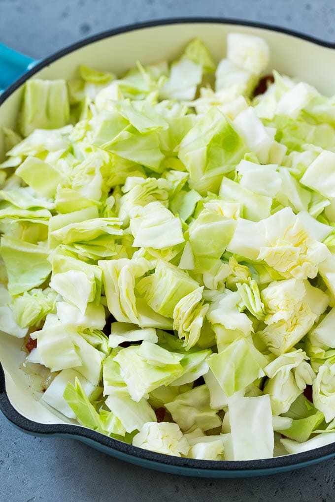 Fried Cabbage Recipe | Cabbage with Bacon | Cabbage Side Dish #cabbage #bacon #sidedish #lowcarb #keto #ezlod Bacon, onions and cabbage in a skillet.
