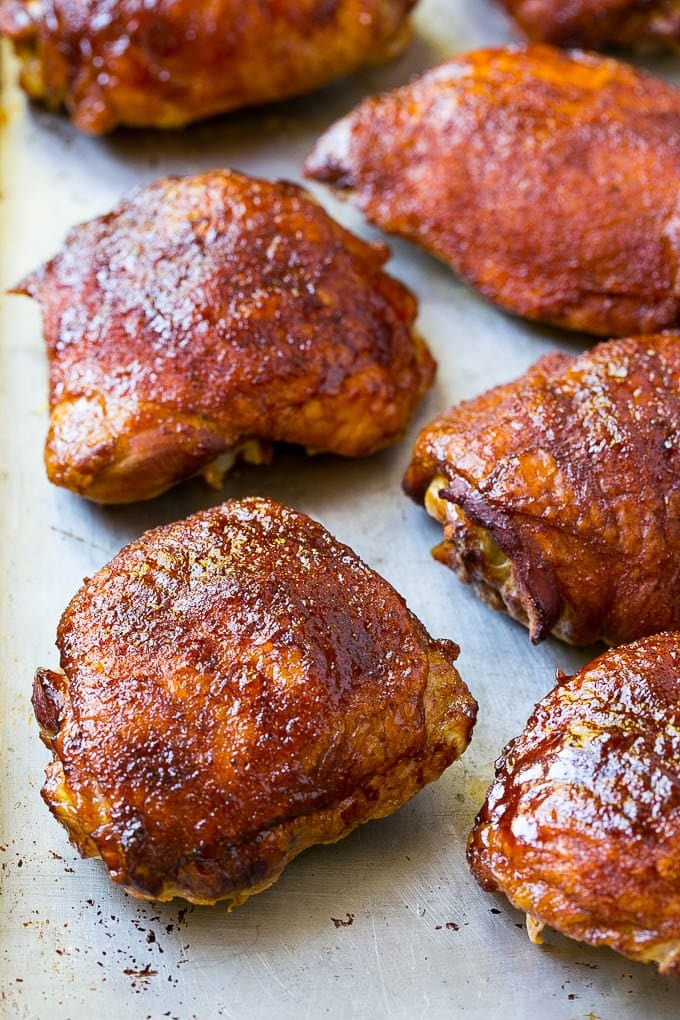 Smoked Chicken Thighs Recipe | Barbecue Chicken Thighs | Easy Chicken Thighs #chicken #barbecue #smoker #dinner #ezlod Cooked poultry on a sheet pan.