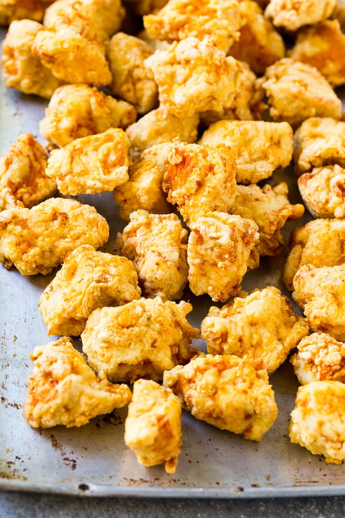 Sweet Chili Chicken Recipe | Thai Chicken | Asian Chicken #chicken #thaifood #chili #dinner #ezlod Fried chicken breast pieces on a sheet pan.