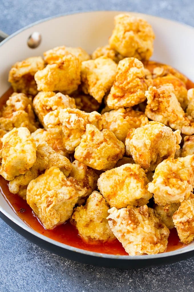 Sweet Chili Chicken Recipe | Thai Chicken | Asian Chicken #chicken #thaifood #chili #dinner #ezlod Crispy chicken breast pieces with sweet chili sauce in a pan.