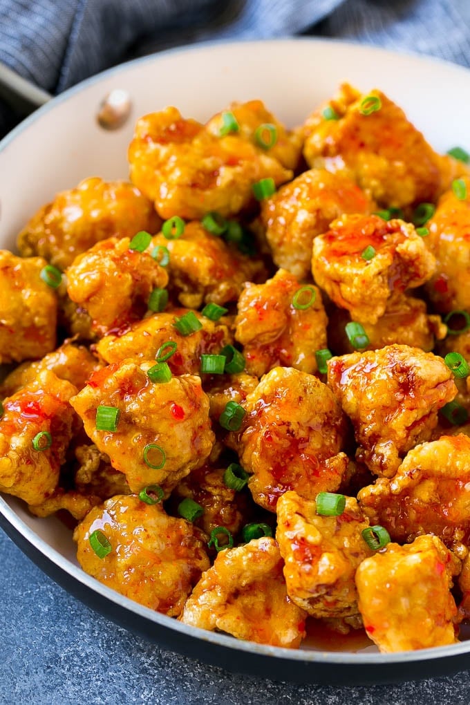 Sweet Chili Chicken Recipe | Thai Chicken | Asian Chicken #chicken #thaifood #chili #dinner #ezlod Sweet chili chicken in a skillet, topped with sliced green onions.