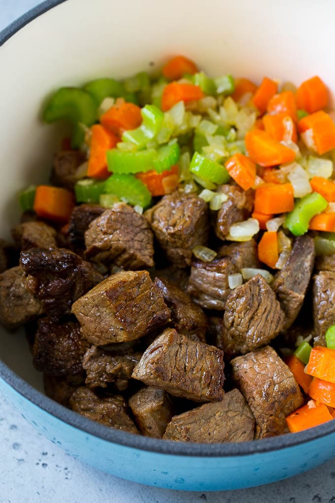 Beef Barley Soup Recipe | Beef Soup | Barley Soup #soup #beef #dinner #vegetables #ezlod #comfortfood Stew meat, carrots, onions and celery in a large pot.