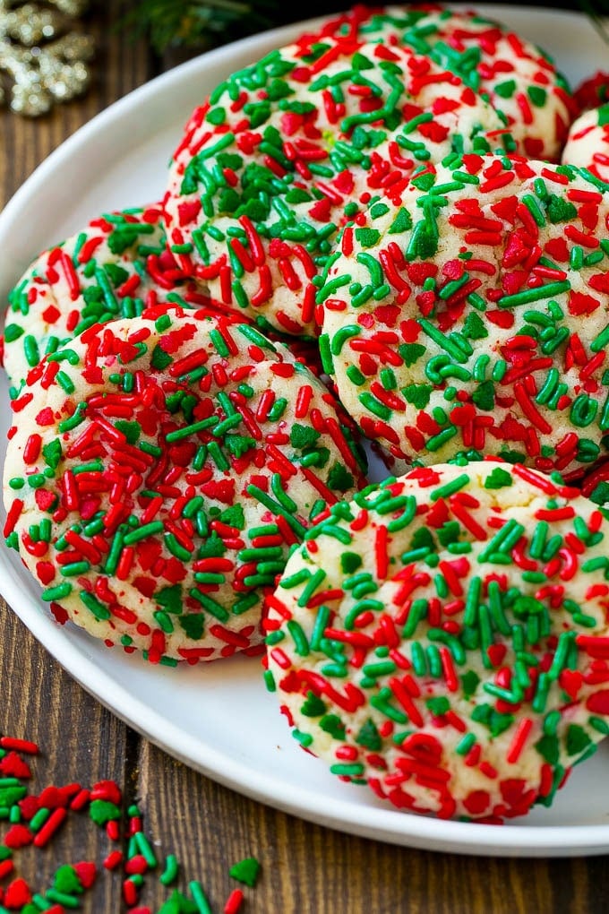 Cake Mix Cookies Recipe | Sprinkle Cookies | Christmas Cookies #cookies #christmas #sprinkles #dessert #baking #ezlod Cake mix cookies with sprinkles on a serving plate.