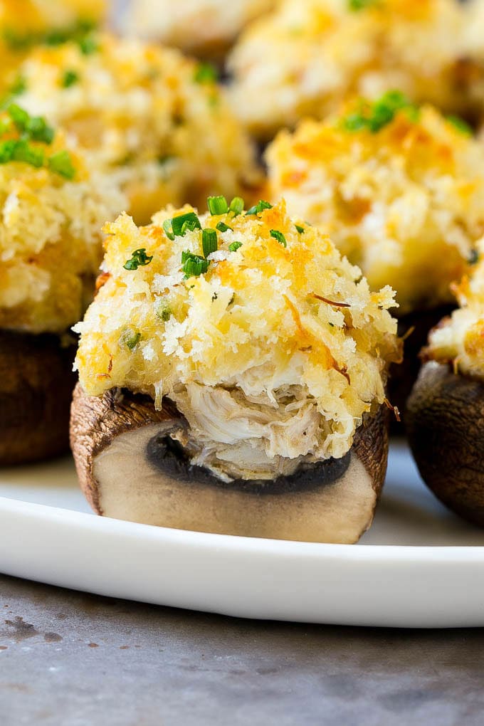 Crab Stuffed Mushrooms Recipe | Stuffed Mushrooms | Mushroom Appetizer #crab #seafood #mushrooms #lowcarb #appetizer #ezlod A cross section of a crab stuffed mushroom.