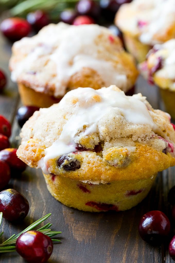 Cranberry Muffins Recipe | Cranberry Orange Muffins #cranberry #muffins #orange #fall #dessert #ezlod Cranberry muffins topped with streusel and orange glaze.
