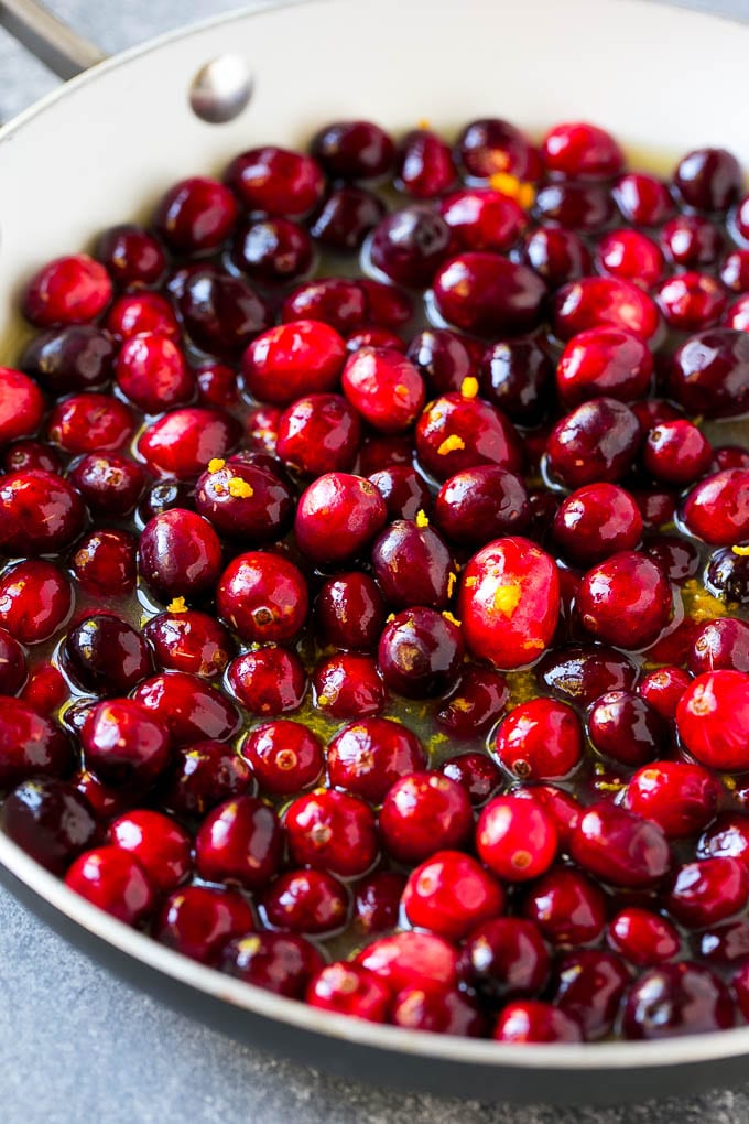 Cranberry Orange Sauce Recipe | Homemade Cranberry Sauce | Fresh Cranberry Sauce #cranberry #orange #fall #thanksgiving #sauce #dinner #ezlod Berries in a skillet with orange juice, sugar and orange zest.