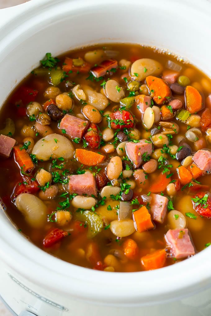 Ham and Bean Soup Recipe | Slow Cooker Ham and Bean Soup | Crockpot Ham and Bean Soup | Leftover Ham Recipe #ham #beans #soup #slowcooker #crockpot #dinner #ezlod Slow cooker ham and bean soup made with vegetables, dried beans and diced ham.