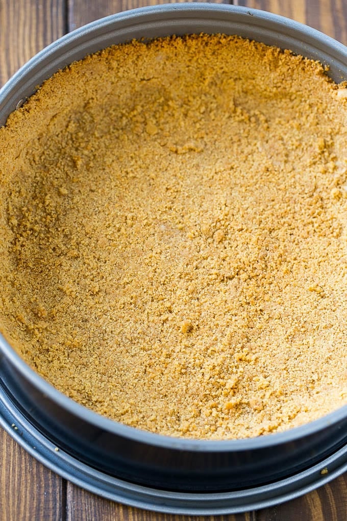 Pumpkin Cheesecake Recipe | Pumpkin Pie Cheesecake | Pumpkin Dessert #pumpkin #thanksgiving #dessert #cheesecake #fall #ezlod A graham cracker crust pressed inside a springform pan.