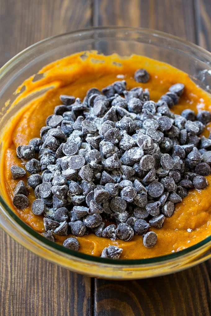 Pumpkin Chocolate Chip Bread Recipe | Pumpkin Bread | Chocolate Pumpkin Bread #pumpkin #bread #fall #chocolate #baking #dessert #ezlod Pumpkin bread batter with chocolate chips in it.