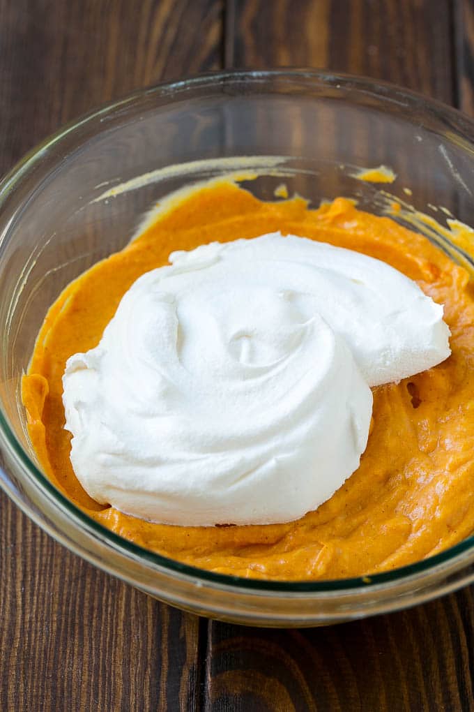 Pumpkin Dip Recipe | Dessert Dip | Pumpkin Pie Dip #pumpkin #dessert #dip #fall #thanksgiving #ezlod Cool whip in a bowl with the creamy base.