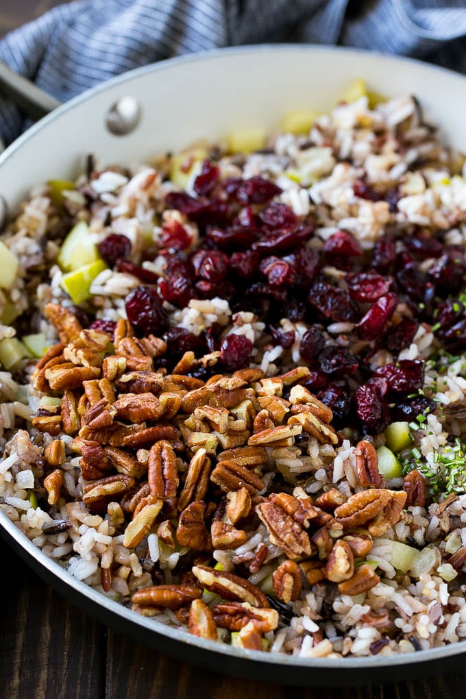 Wild Rice Pilaf Recipe | Thanksgiving Side Dish | Rice Pilaf #rice #apple #cranberry #fall #glutenfree #thanksgiving #ezlod Apples and wild rice topped with dried cranberries, pecans and herbs.