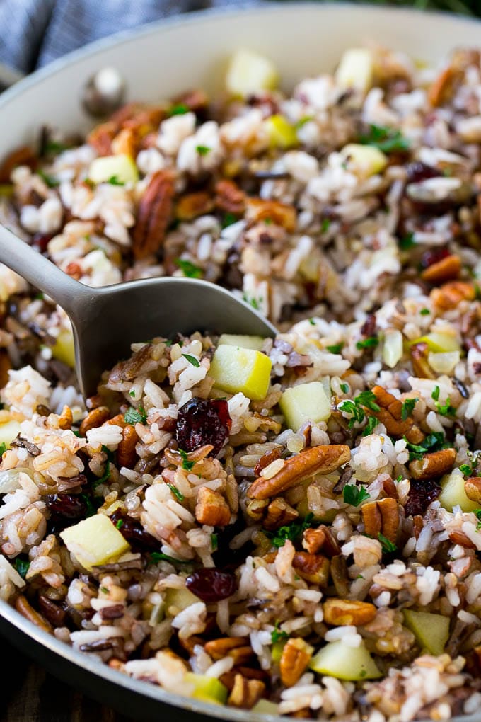 Wild Rice Pilaf Recipe | Thanksgiving Side Dish | Rice Pilaf #rice #apple #cranberry #fall #glutenfree #thanksgiving #ezlod A skillet of rice pilaf with apples, cranberries and pecans.