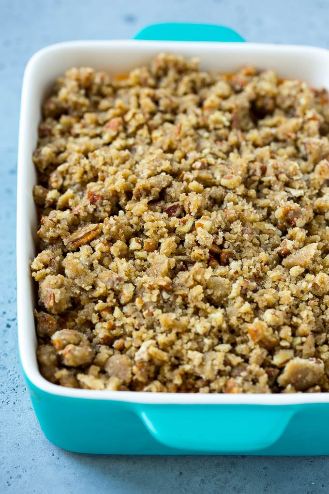 Ruth's Chris Sweet Potato Casserole Recipe | Sweet Potato Casserole | Mashed Sweet Potatoes #sweetpotatoes #casserole #thanksgiving #christmas #holidays #dinner #ezlod #sidedish Mashed sweet potatoes topped with a brown sugar and pecan streusel.