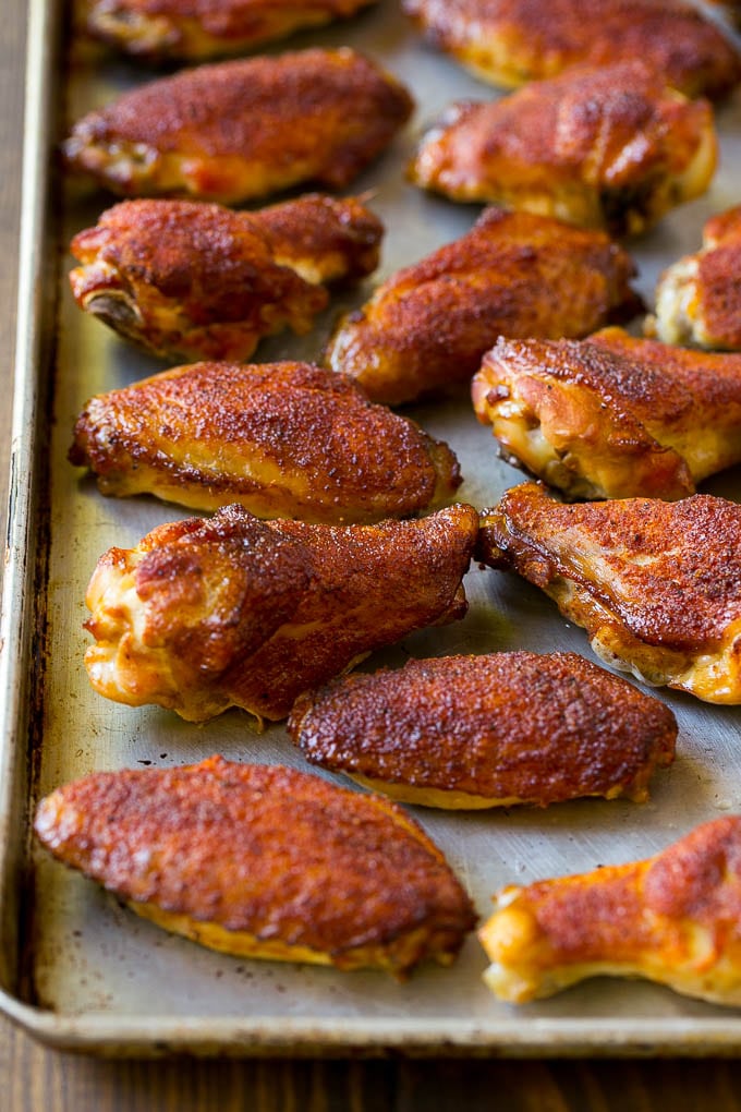 Smoked Chicken Wings | Barbecue Chicken Wings | BBQ Chicken Wings #chicken #wings #bbq #barbecue #appetizer #dinner #ezlod Smoked chicken wings coated in spice rub on a sheet pan.