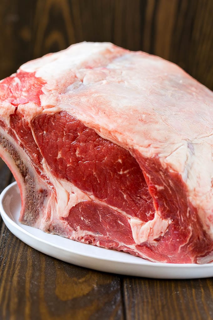 Smoked Prime Rib Recipe | Easy Prime Rib | Smoked Beef | Holiday Prime Rib #primerib #beef #smoker #dinner #ezlod #christmas #thanksgiving #lowcarb #keto An uncooked standing rib roast.