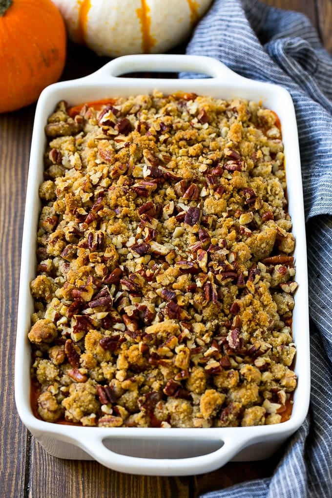 Sweet Potato Casserole with Pecans Recipe | Sweet Potato Casserole | Sweet Potato Side Dish #sweetpotatoes #thanksgiving #pecans #casserole #sidedish #holiday #fall #ezlod Sweet potato casserole with pecans and brown sugar streusel in a baking dish.