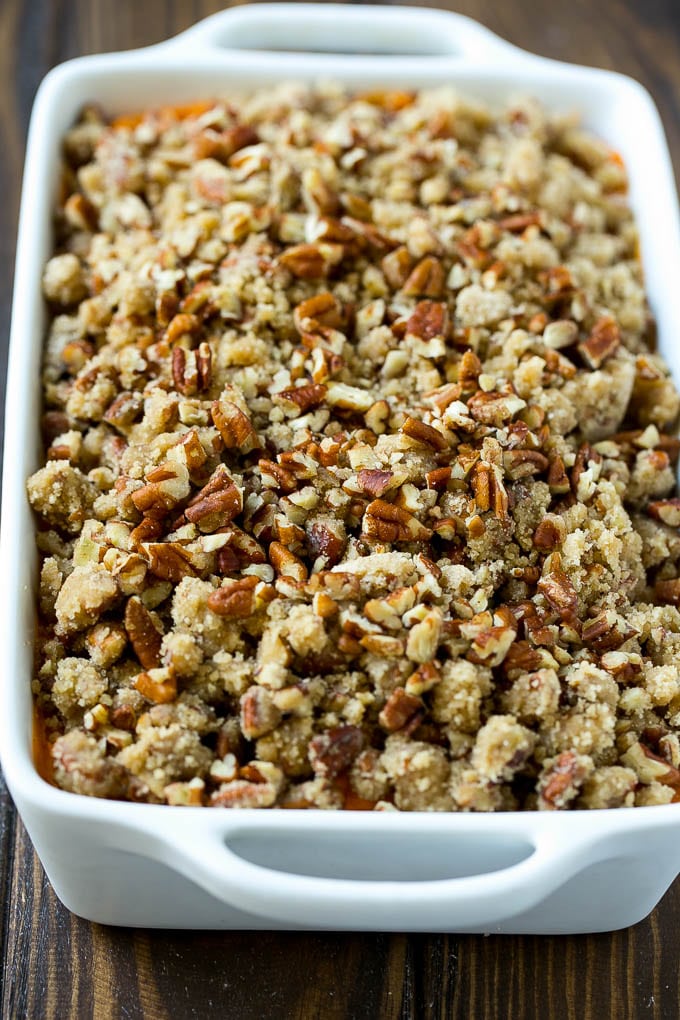 Sweet Potato Casserole with Pecans Recipe | Sweet Potato Casserole | Sweet Potato Side Dish #sweetpotatoes #thanksgiving #pecans #casserole #sidedish #holiday #fall #ezlod An uncooked sweet potato casserole with pecan streusel.