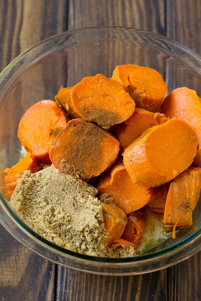 Sweet Potato Casserole with Pecans Recipe | Sweet Potato Casserole | Sweet Potato Side Dish #sweetpotatoes #thanksgiving #pecans #casserole #sidedish #holiday #fall #ezlod Sliced sweet potatoes with brown sugar, butter and spices.