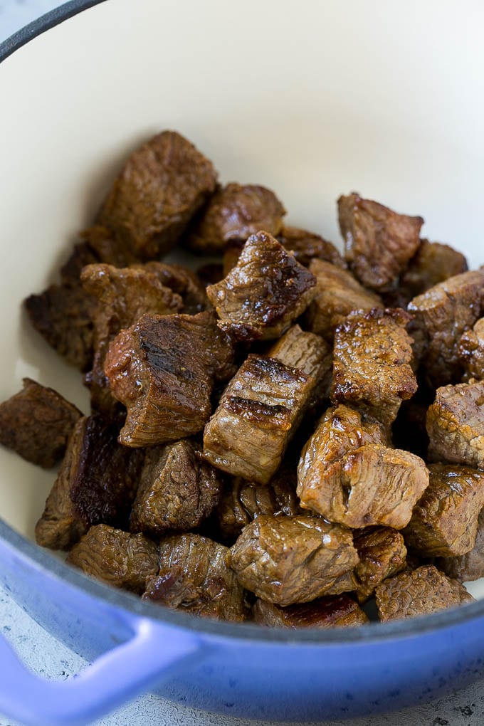 Vegetable Beef Soup Recipe | Beef Vegetable Soup | Beef Soup #beef #veggies #soup #dinner #glutenfree #ezlod Browned pieces of beef stew meat in a soup pot.