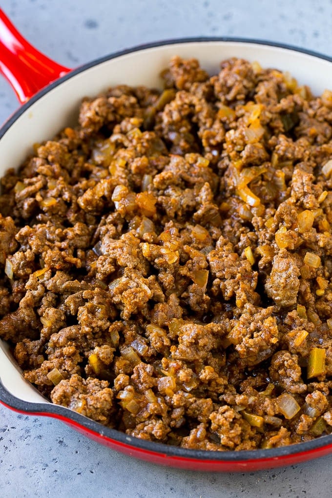 Dorito Casserole Recipe | Mexican Casserole | Beef Casserole #mexicanfood #beef #groundbeef #casserole #dinner #ezlod Ground beef, onions and salsa in a skillet.