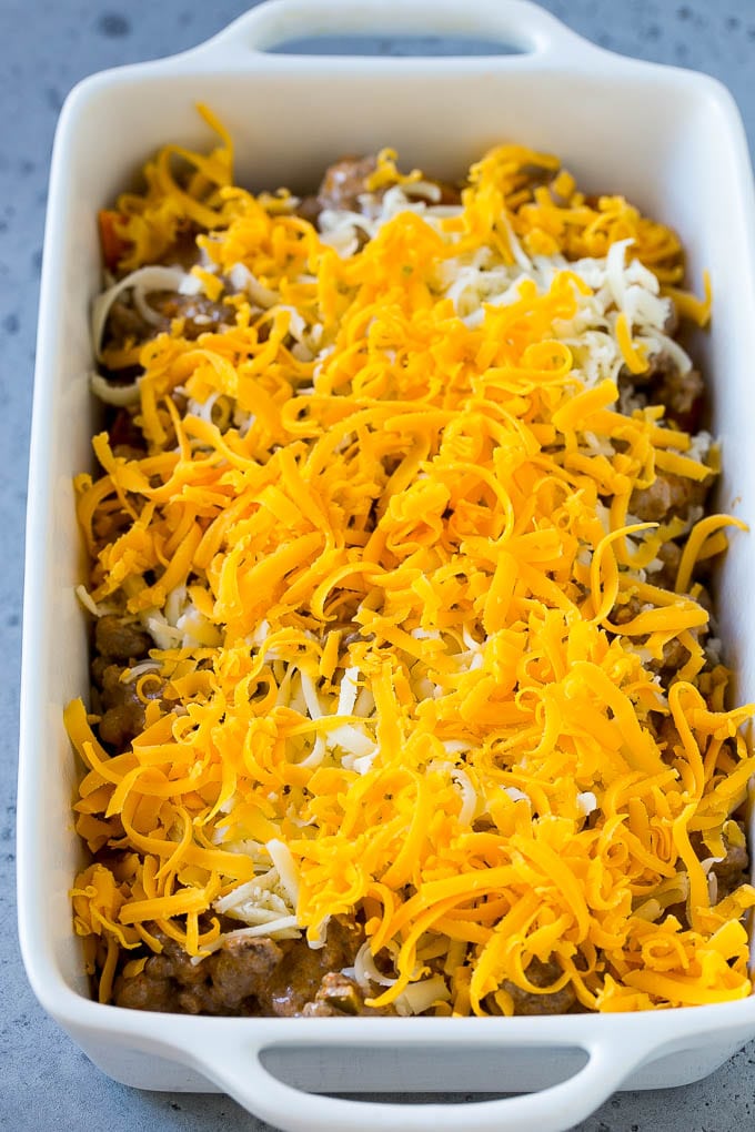 Dorito Casserole Recipe | Mexican Casserole | Beef Casserole #mexicanfood #beef #groundbeef #casserole #dinner #ezlod A dish layered with chips, ground beef and shredded cheese.