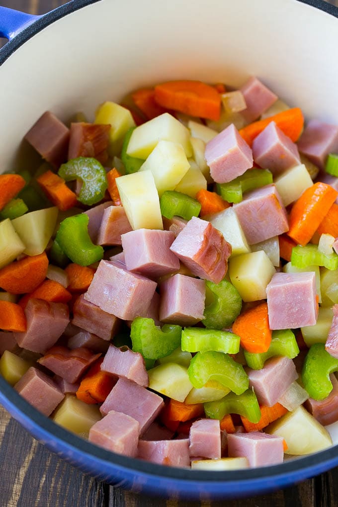 Ham and Potato Soup | Ham Soup | Potato Soup #soup #ham #potato #dinner #comfortfood #ezlod Diced ham, carrots, potatoes and celery in a soup pot.