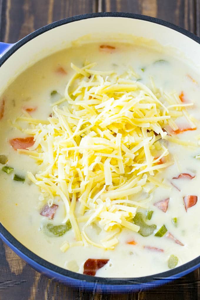Ham and Potato Soup | Ham Soup | Potato Soup #soup #ham #potato #dinner #comfortfood #ezlod Shredded white cheddar cheese to be stirred into ham and potato soup.