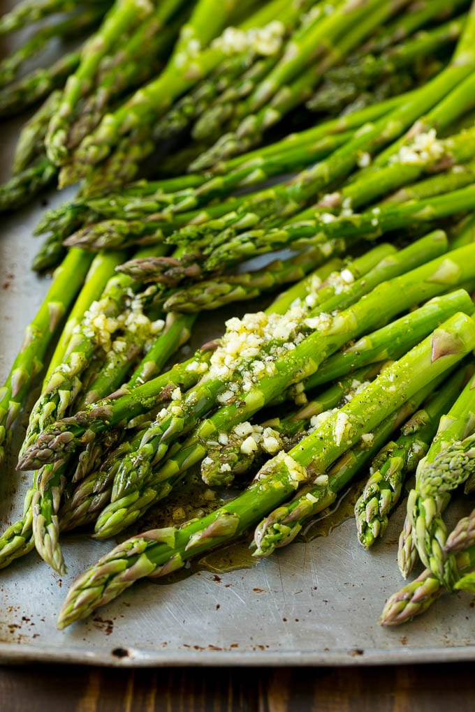 Roasted Asparagus Recipe | Baked Asparagus | Asparagus Side Dish #asparagus #garlic #sidedish #keto #lowcarb #dinner #ezlod Raw spears drizzled with olive oil, garlic, herbs, salt and pepper.
