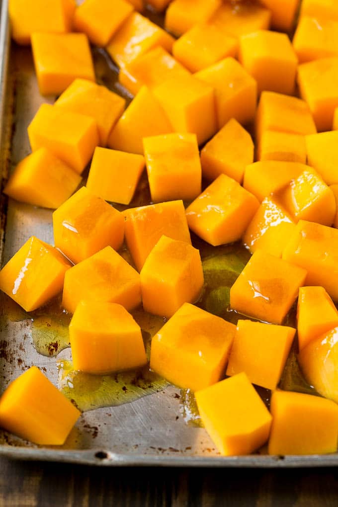 Roasted Butternut Squash Recipe | Baked Butternut Squash | Butternut Squash Side Dish #butternutsquash #squash #fall #vegetarian #dinner #ezlod Cubes of winter squash coated in olive oil, brown sugar and maple syrup.