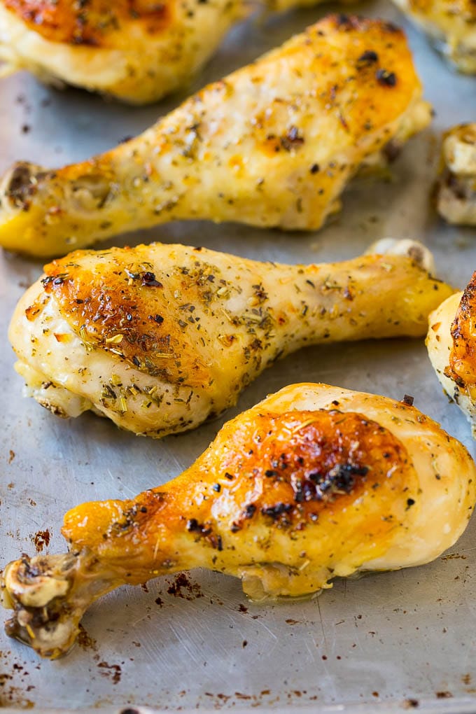 Baked Chicken Drumsticks Recipe | Roasted Chicken Drumsticks | Garlic and Herb Chicken #dinner #chicken #garlic #glutenfree #lowcarb #keto #cleaneating #ezlod Baked chicken drumsticks on a sheet pan.