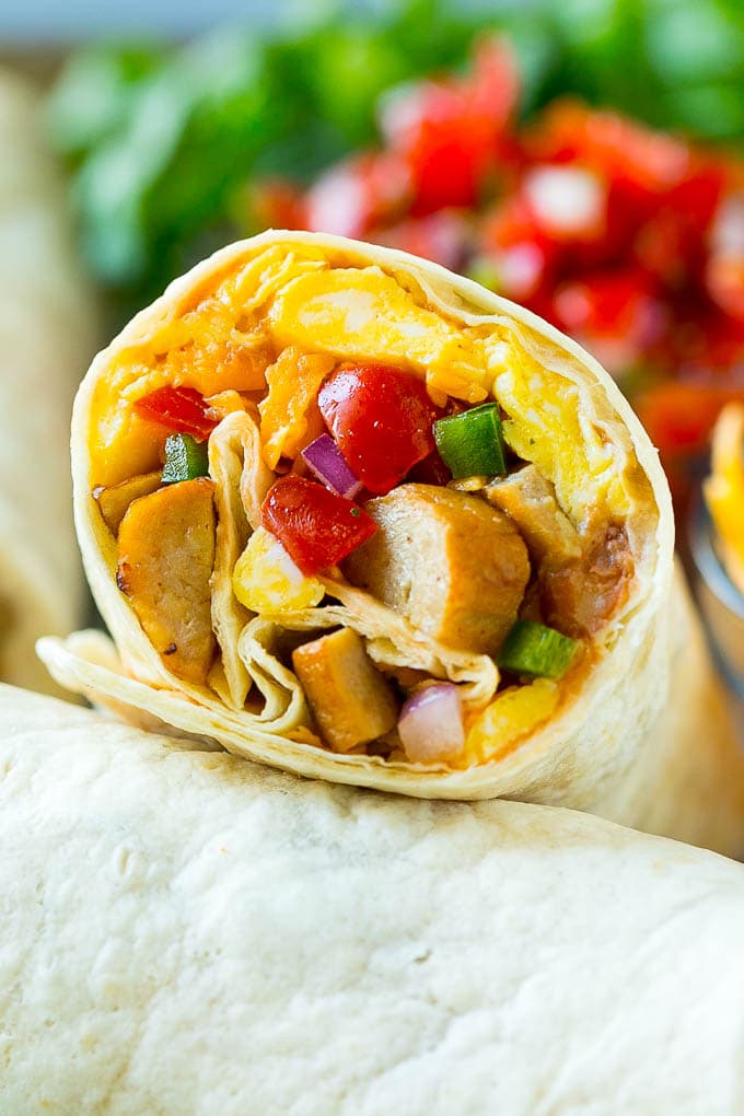 Breakfast Burrito Recipe | Sausage Breakfast Burrito #breakfast #sausage #eggs #burrito #ezlod A breakfast burrito stuffed with sausage, eggs, pico de gallo and cheese.