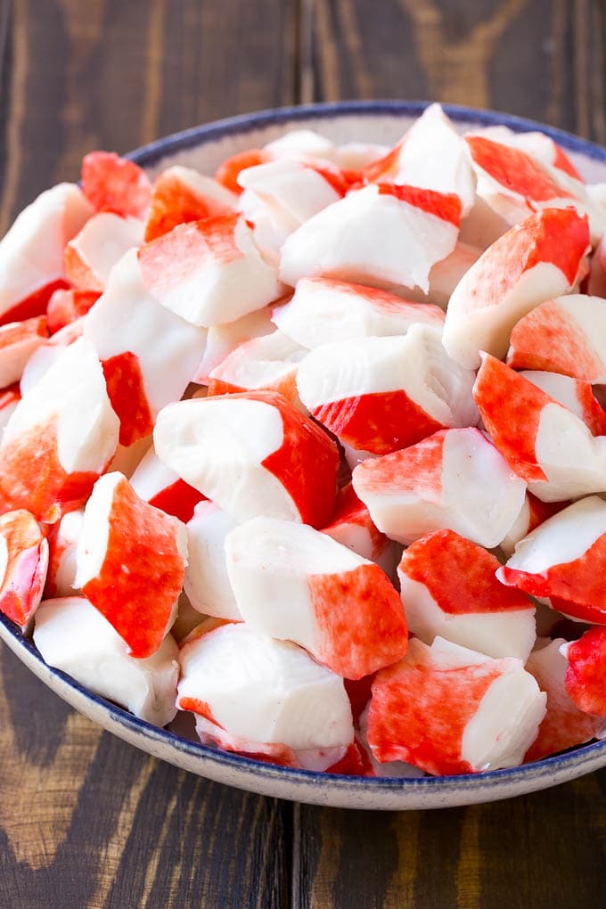 Crab Salad Recipe | Seafood Salad | Deli Salad #crab #salad #seafood #lowcarb #keto #lunch #dinner #ezlod Imitation crab flakes in a bowl.