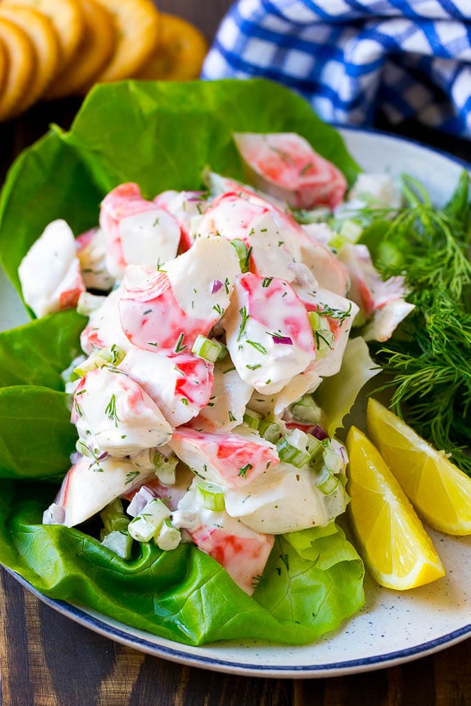 Crab Salad Recipe | Seafood Salad | Deli Salad #crab #salad #seafood #lowcarb #keto #lunch #dinner #ezlod Crab salad served on a bed of lettuce with a side of crackers.