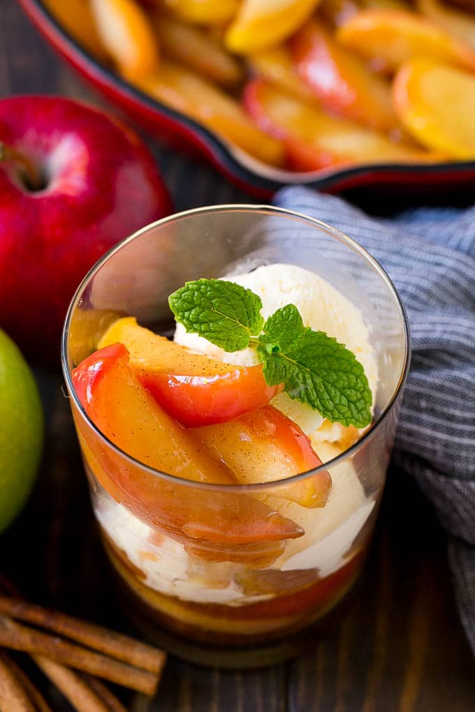 Fried Apples Recipe | Sauteed Apples | Cinnamon Sugar Apples #apples #cinnamon #sugar #sidedish #dessert #ezlod #fall A cup of fried apples served with vanilla ice cream and garnished with fresh mint.