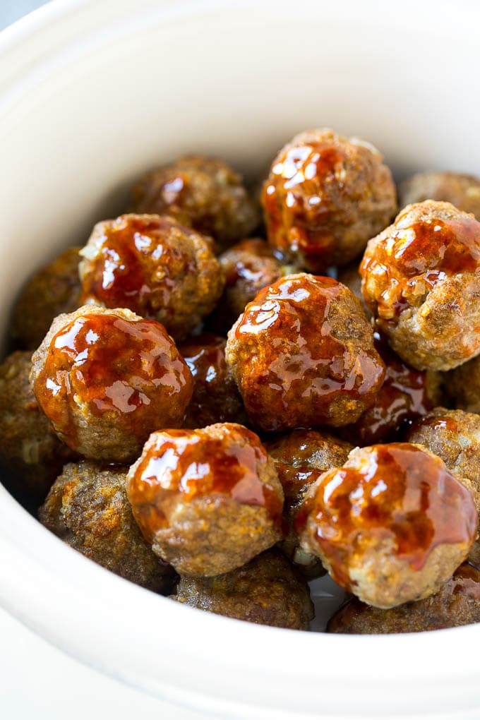 Sweet and Sour Meatballs Recipe | Slow Cooker Meatballs | Crockpot Meatballs | Cocktail Meatballs #meatballs #beef #slowcooker #crockpot #dinner #appetizer #ezlod Meatballs in a slow cooker coated in sweet and sour sauce.