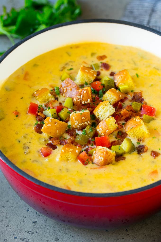 Cheeseburger Soup Recipe | Hamburger Soup | Cheese Soup #soup #groundbeef #hamburger #cheese #bacon #dinner #ezlod Cheeseburger soup topped with bacon, tomato, pickles and croutons.