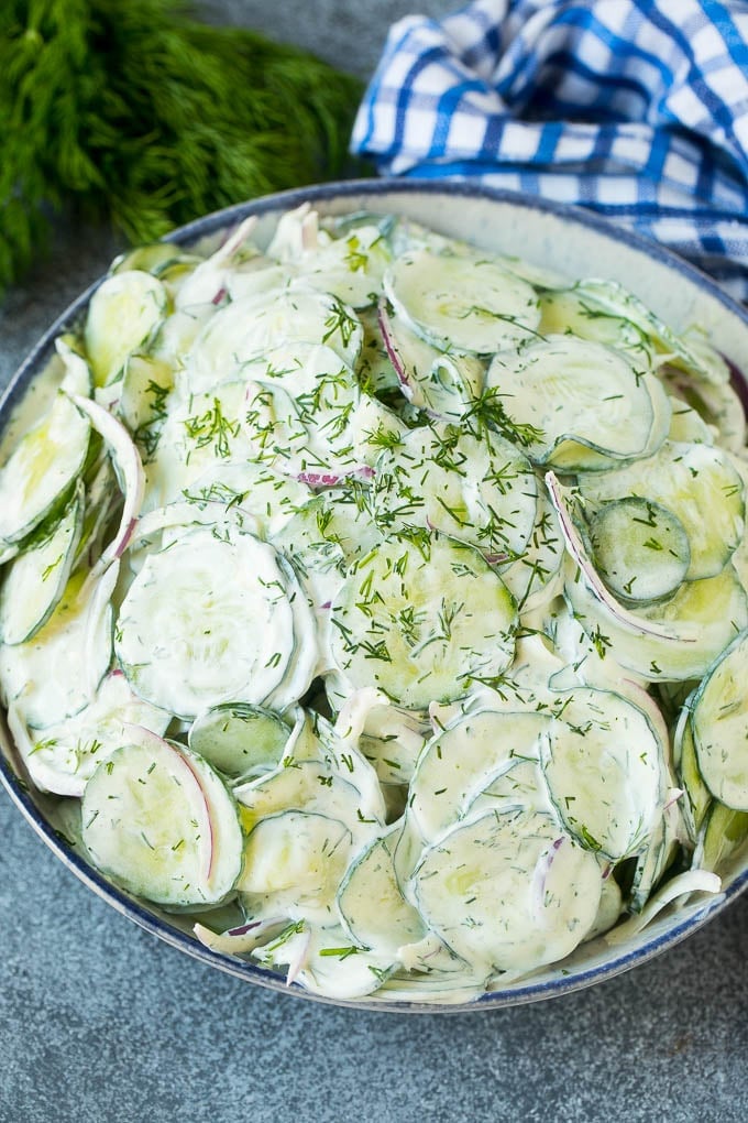 Creamy Cucumber Salad Recipe | German Cucumber Salad | Cucumber Salad #cucumber #salad #dinner #lunch #ezlod #cucumbersalad Creamy cucumber salad with red onion and dill, topped with fresh herbs for garnish.