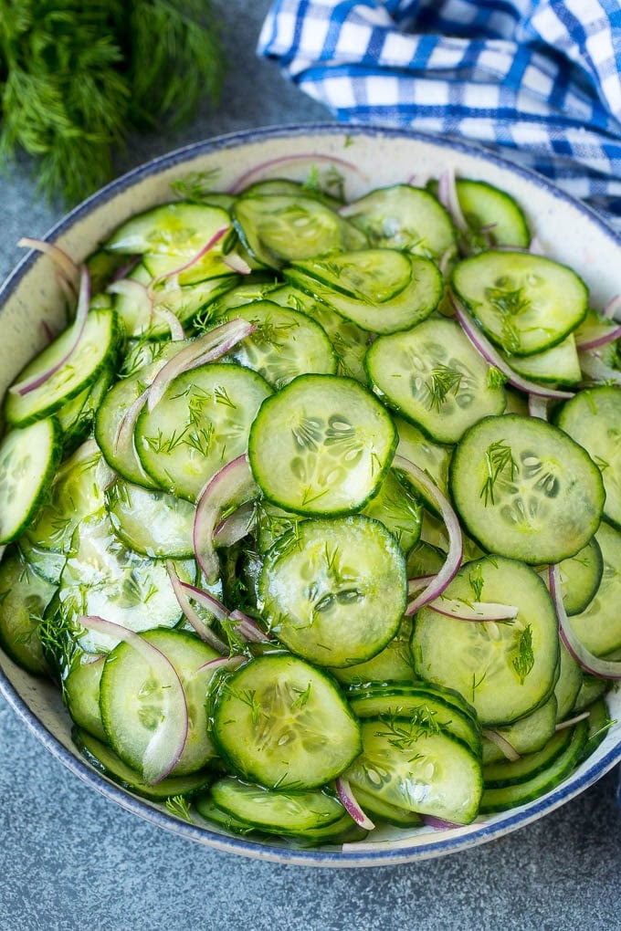 Cucumber Salad Recipe | Cucumber Dill Salad | Cucumber Recipe #cucumbers #salad #glutenfree #sidedish #ezlod Cucumber salad in a serving bowl with sliced English cucumbers, red onion and fresh dill.
