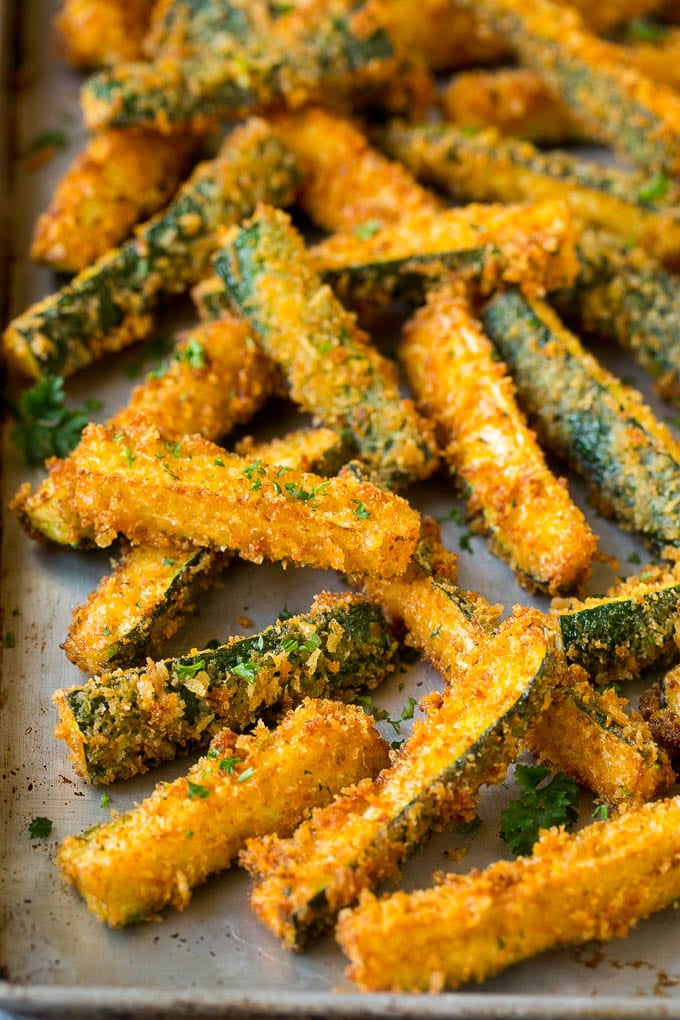 Fried Zucchini Recipe | Zucchini Fries | Zucchini Recipe #appetizer #zucchini #snack #ezlod Fried zucchini sticks on a sheet pan.