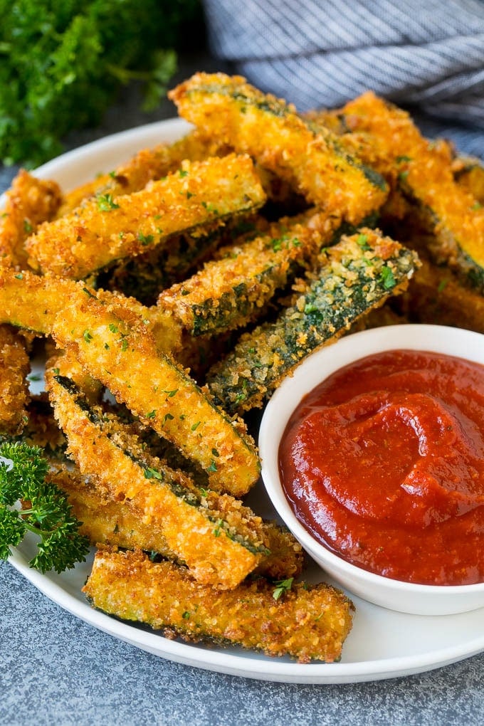 Fried Zucchini Recipe | Zucchini Fries | Zucchini Recipe #appetizer #zucchini #snack #ezlod A plate of fried zucchini served with marinara for dipping.