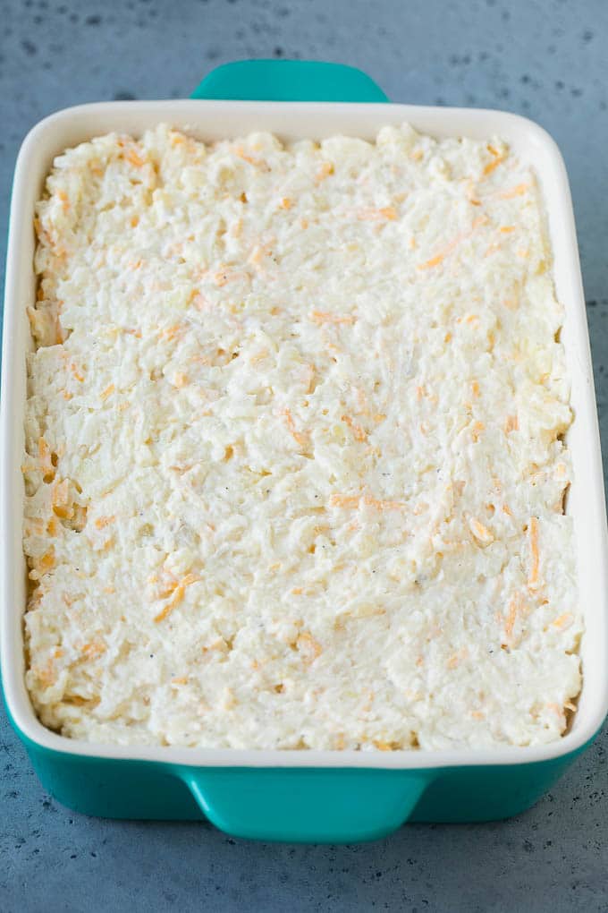 Hash Brown Casserole | Potato Casserole | Hash Brown Side Dish #potatoes #cheese #casserole #sidedish #ezlod A mixture of hash browns, sour cream, cheese and seasonings in a casserole dish.
