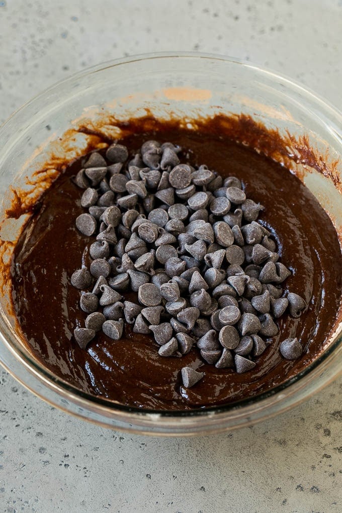 Oreo Brownies Recipe | Homemade Brownies | Chocolate Chip Brownies #brownies #oreos #chocolate #dessert #sweets #ezlod Chocolate brownie batter with chocolate chips in it.