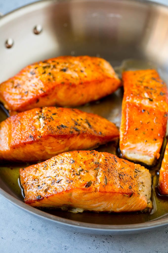 Greek Salmon Salad Recipe | Low Carb Salmon Recipe | Salmon Salad #salmon #seafood #fish #lowcarb #keto #lunch #ezlod #healthy Seared fish fillets in a skillet.