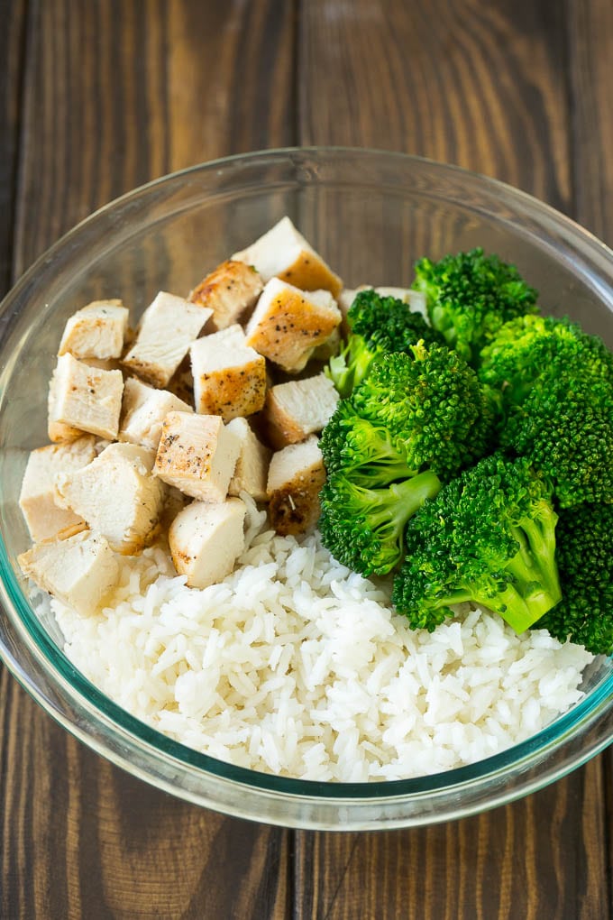 Chicken Casserole Recipe | Chicken and Rice Casserole | Chicken and Broccoli Casserole #casserole #chicken #rice #broccoli #cheese #dinner #ezlod Chicken, broccoli and rice in a mixing bowl.